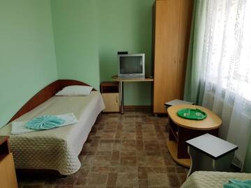 Фото номера Двухместный номер с 2 отдельными кроватями и собственной ванной комнатой Мотели Volkovysk Motel г. Волковыск 3